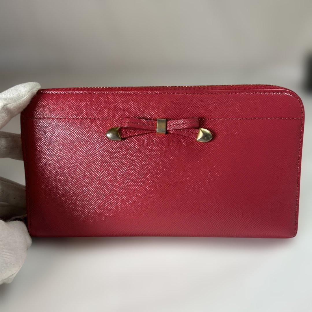 【sk/7.20/30】PRADA ピンク 二つ折り財布 リボン付き